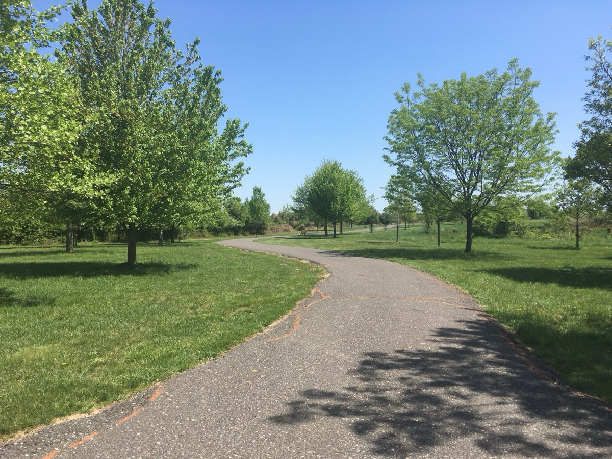 Paved walking path through Warminster Community Park, Bucks County PA